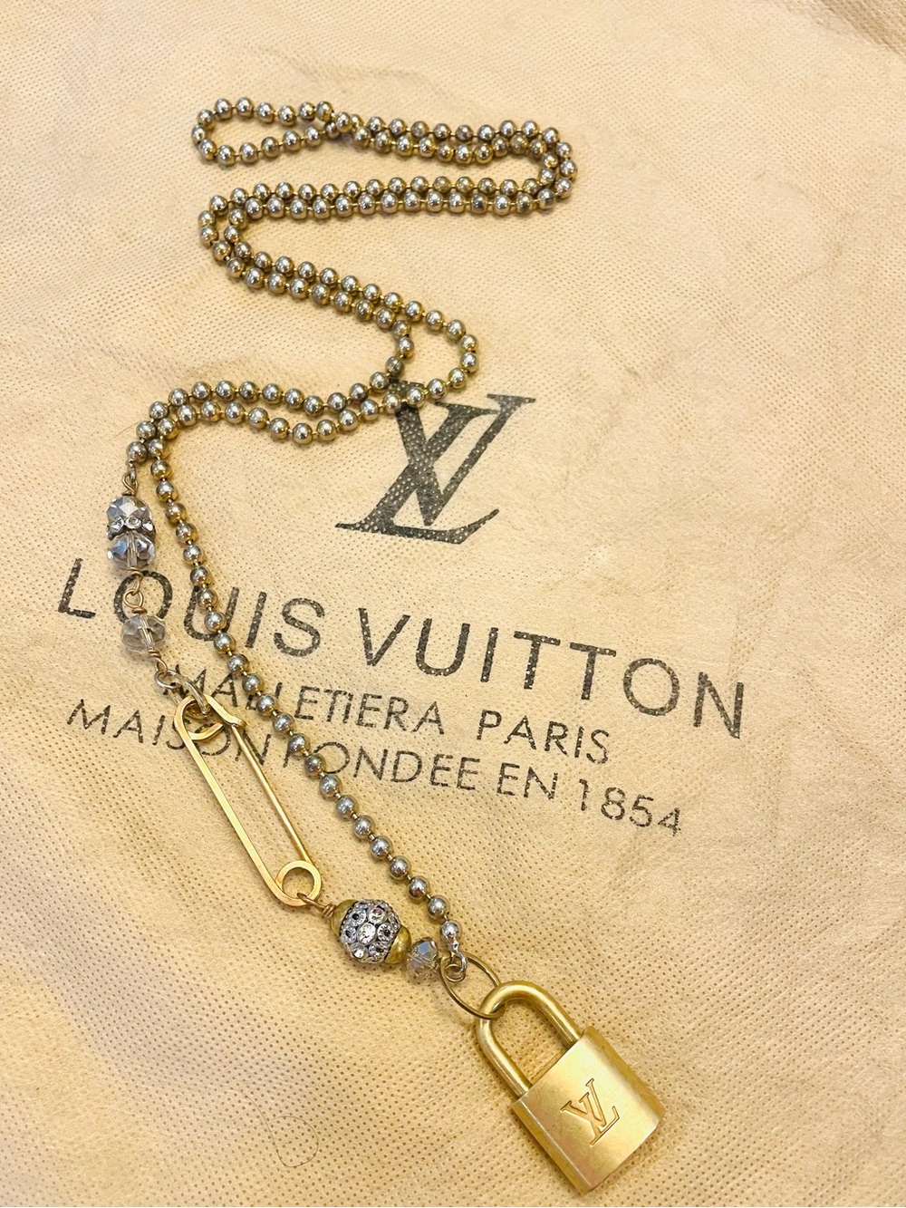 LOUIS VUITTON~RARE & UNIQUE 39" LV LOCK 311, Brass-Tone, Crystal Decor Necklace